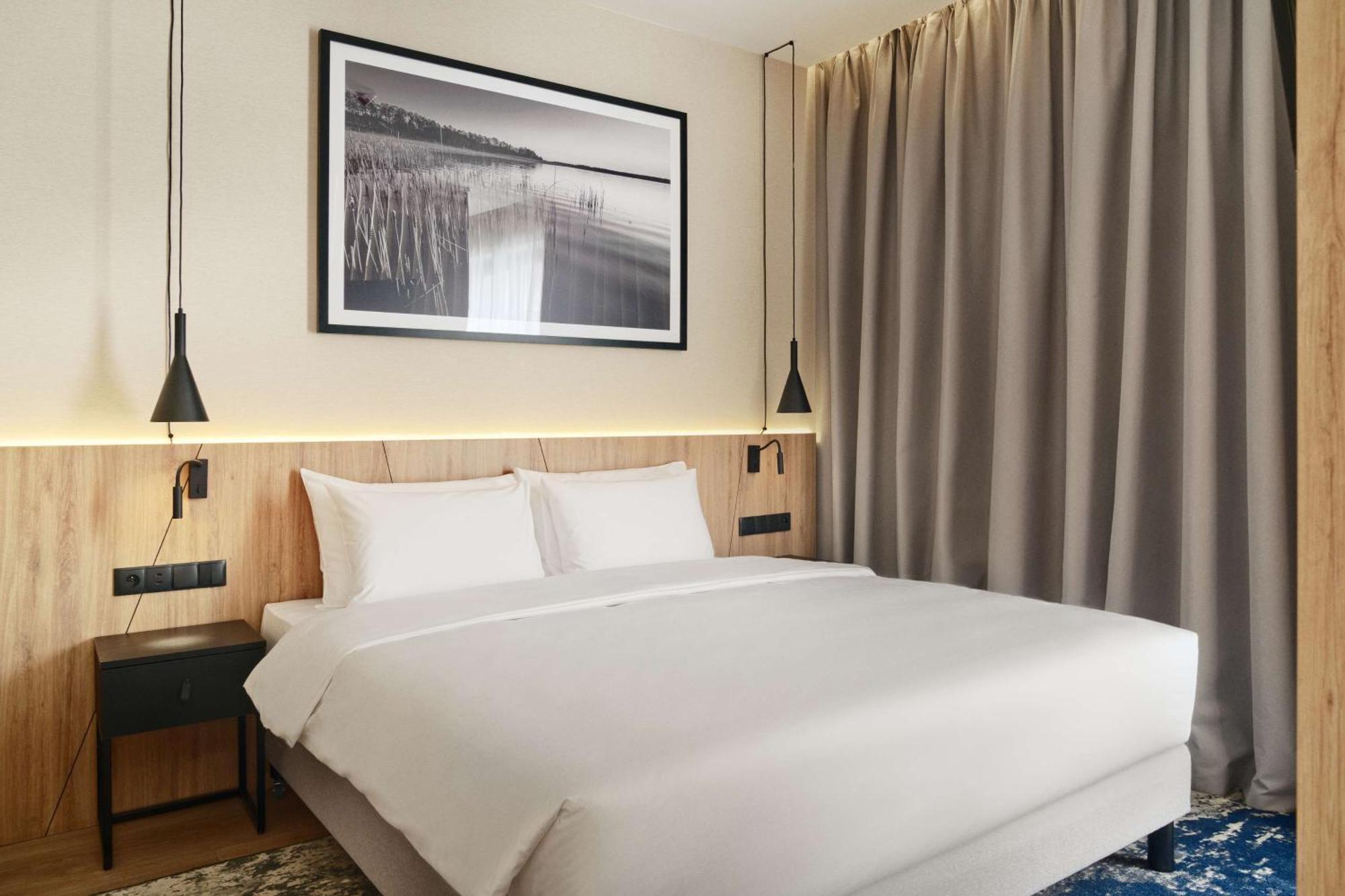 Radisson Blu Resort & Conference Center, Ostroda Mazury المظهر الخارجي الصورة A bedroom at the hotel